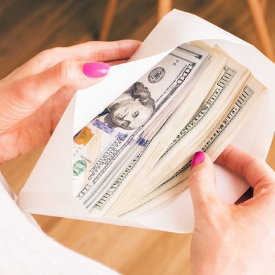 Woman Holding Envelope Cash