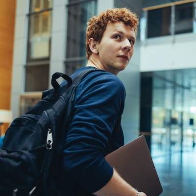 College Student Looking Over The Shoulder