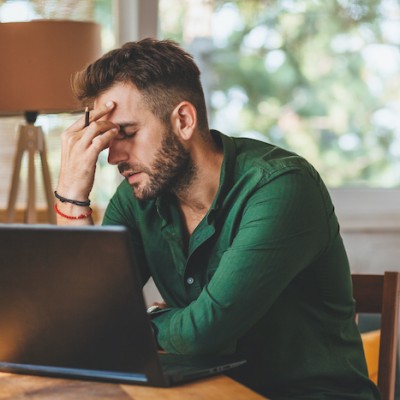 Man Confused At Laptop