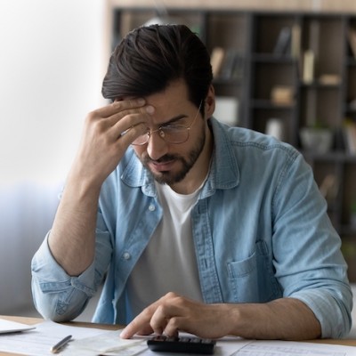 Man Stressed Doing Taxes