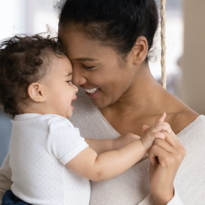 Mother Holding Baby Close