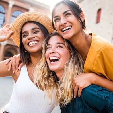 Three Girl Friends Pose For Photo