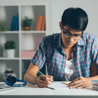 Young Man Doing Homework